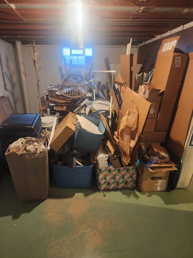 Roll-off dumpster container at job site for 2 Yard Dumpster Rental in Lakeland South